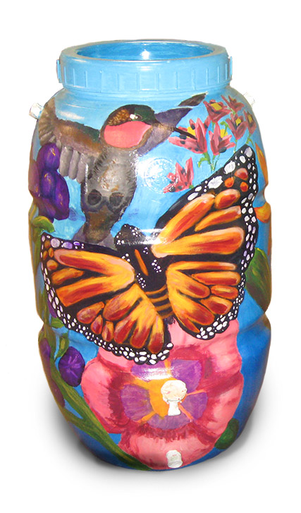 A painted rain barrel with a butterfly and hummingbird