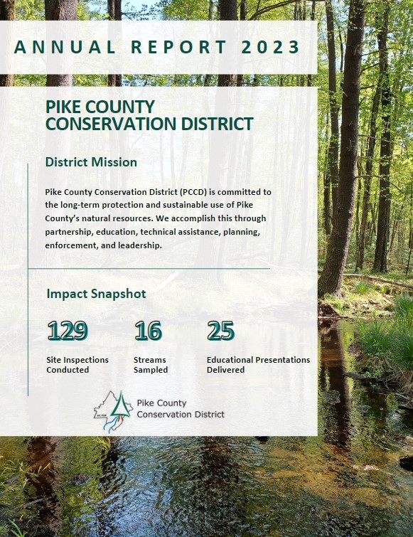 The cover of the Annual Report features text over a photo of forested stream. The text details the mission of the District and some highlighted statistics from the year.