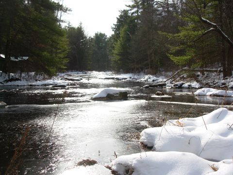 Photo of Blooming Grove Creek in winter in Pike County, PA. Download the DEP guide to stream work in your community.