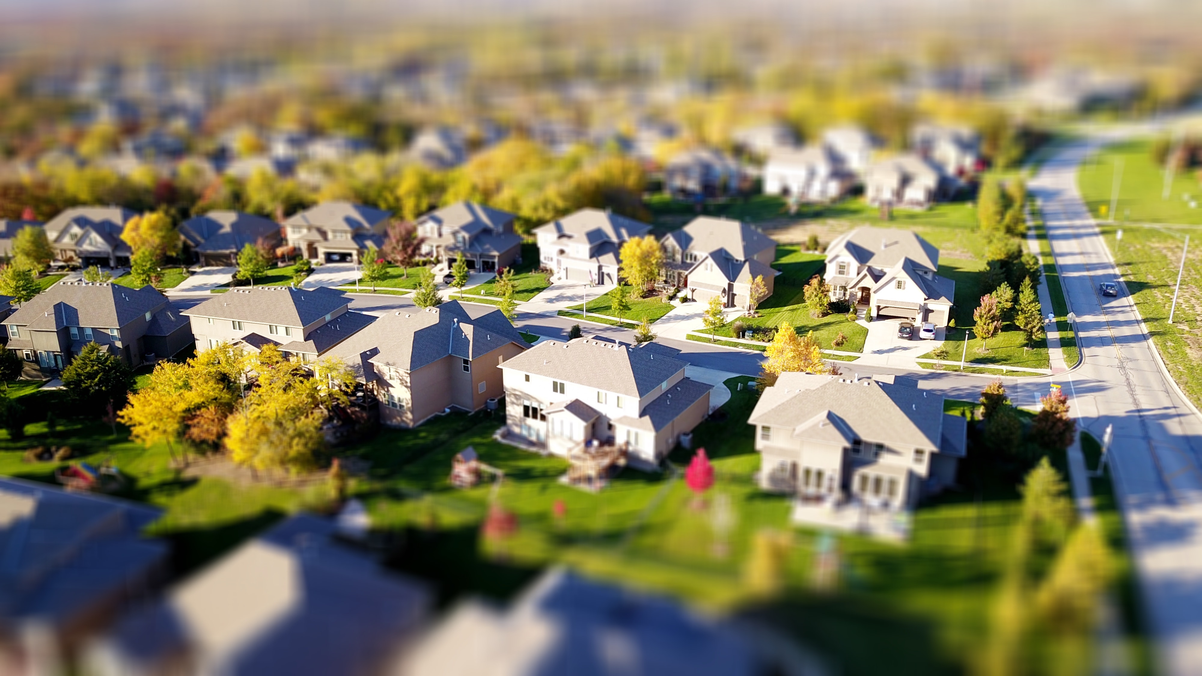 An aerial shot of an almost computer generated looking housing development